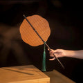 Chinese rolling bamboo fan
