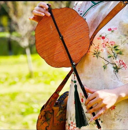Chinese rolling bamboo fan